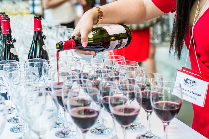 woman pouring wine